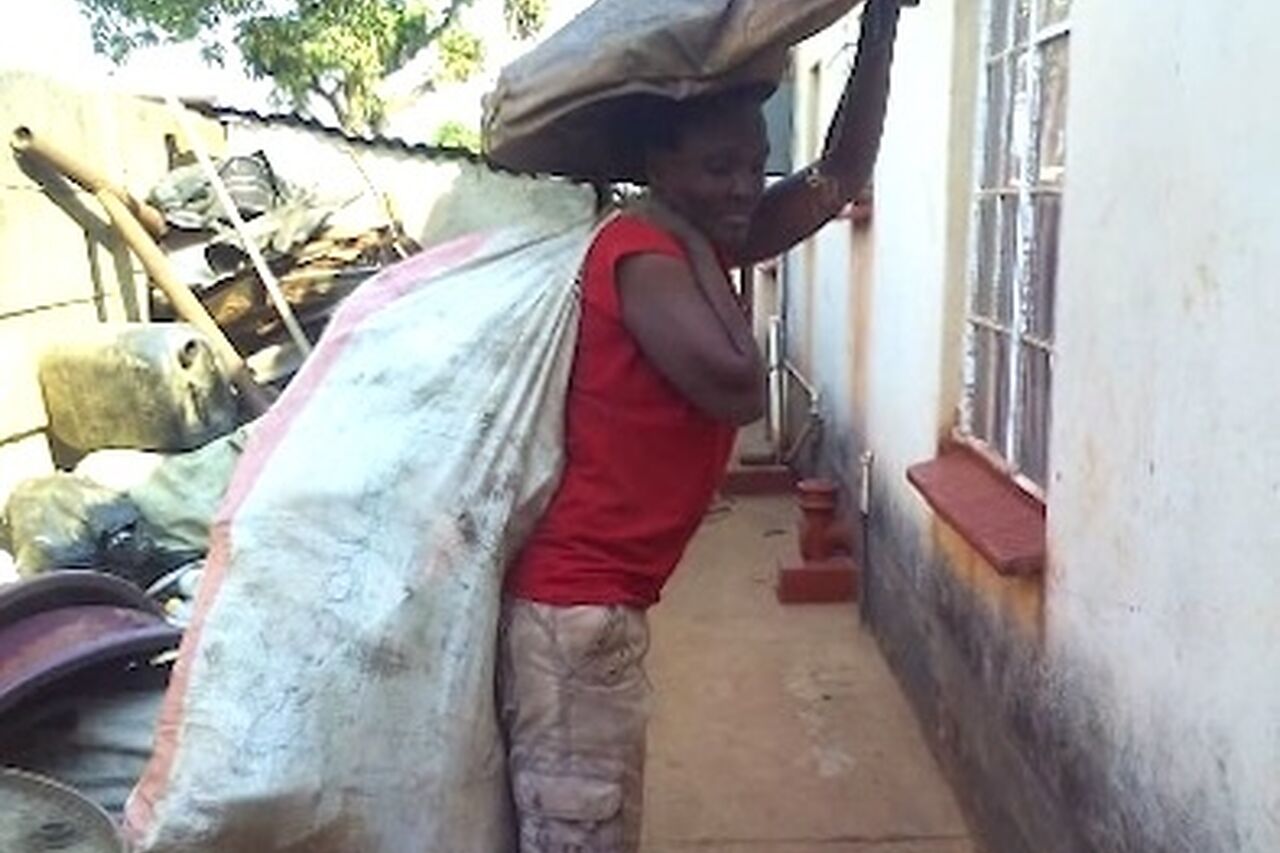 Muchaneta collecting waste