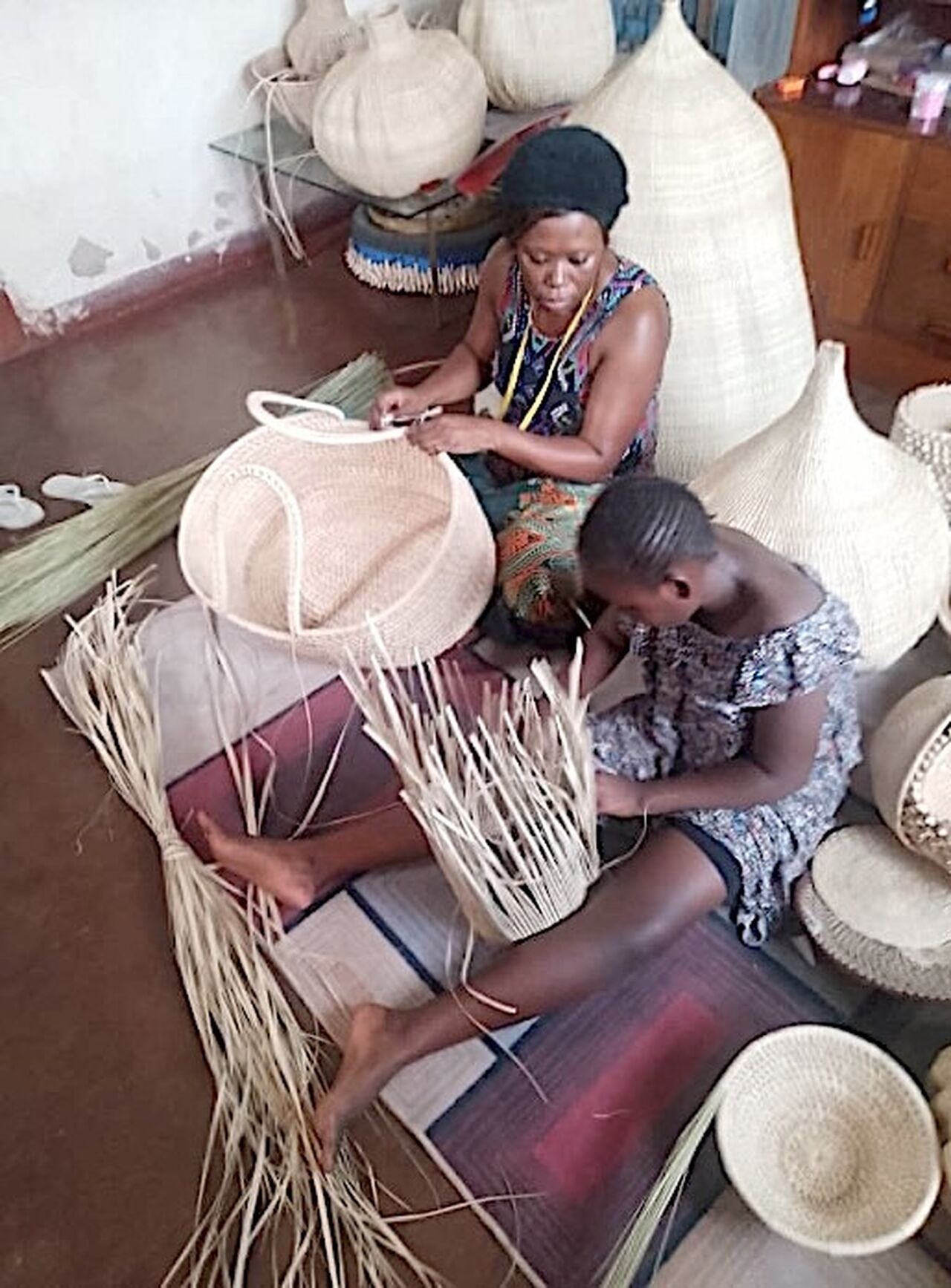 Ncamusile Ngwenya weaving baskets
